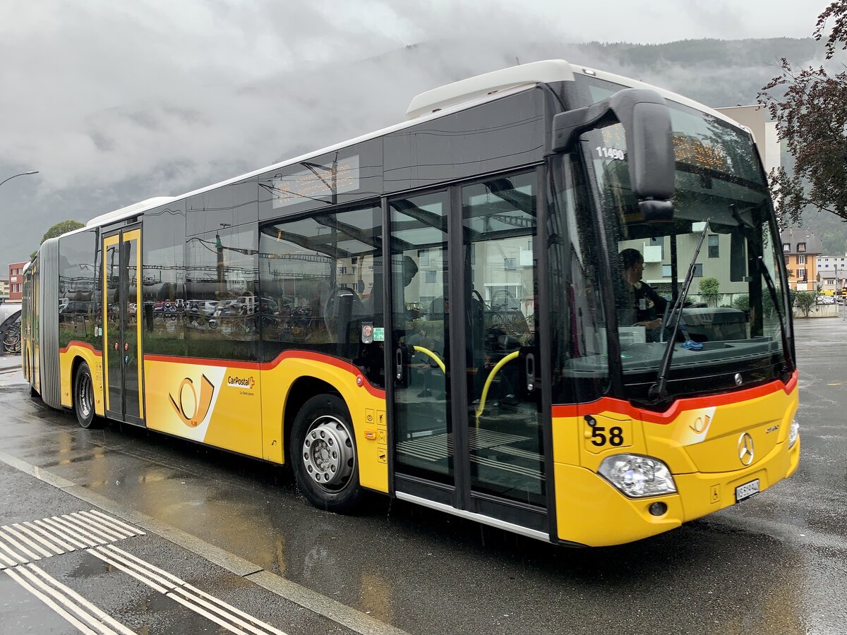 Der MB C2 G '11490'  VS 519 940  der PostAutp Regie Sitten am 20.9.21 beim Bahnhof Matigny.