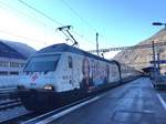 Re 460 041 SRK Werbelok die gleich mit dem IC823 Richtung Romanshorn aufbrechen wird, am 28.12.16 in Brig.
